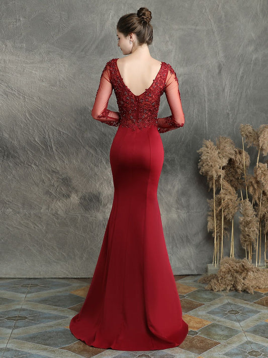 Handmade applique studded long sleeved evening dress