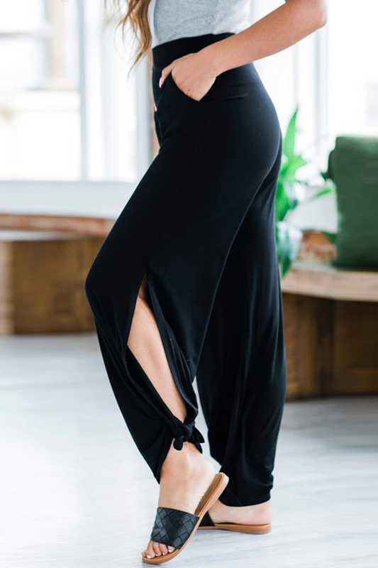 Pantalones casuales de color liso, holgados, con pernera ancha y nudos, con aberturas.