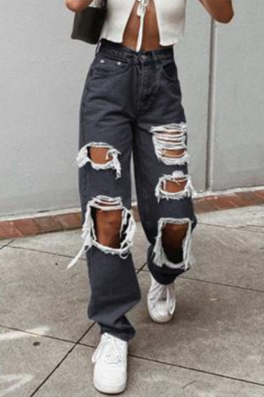 Pantalones de pierna ancha con parches y borlas rasgados de estilo urbano