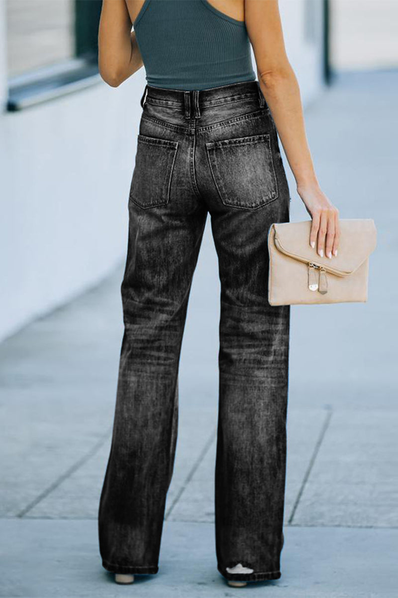 Vaqueros casuales de corte bota con rotos y rasgados