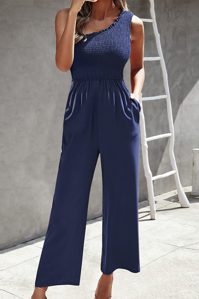 Mono holgado informal con cuello oblicuo, bolsillos y estampado de patchwork