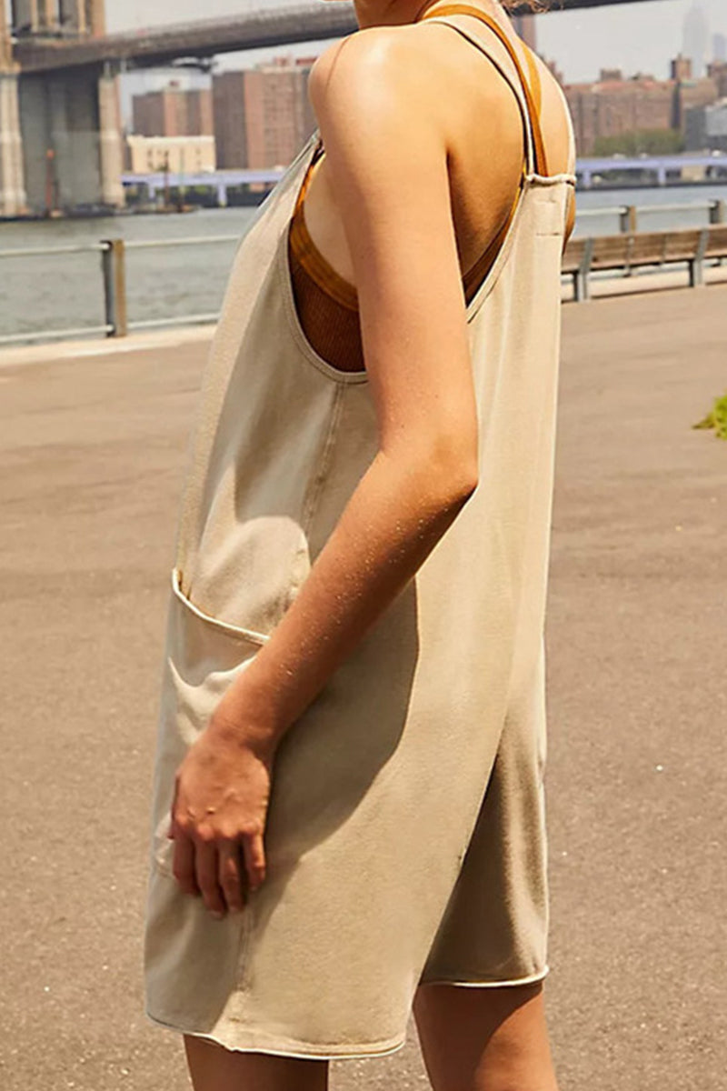 Mono holgado informal sencillo con cuello en V y bolsillos lisos