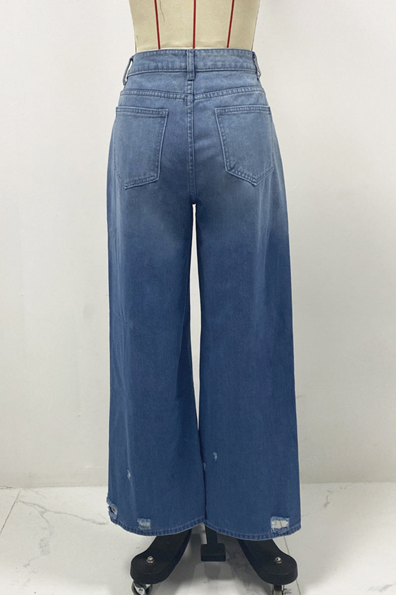 Vaqueros holgados de cintura alta con bolsillos rotos y degradado de color para uso informal en la calle