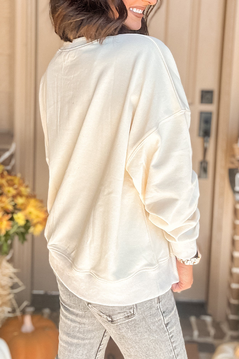 Sudadera informal con cuello redondo y parche de calabaza