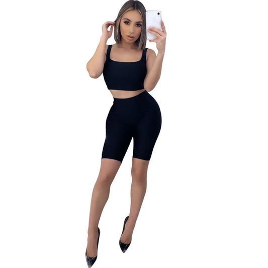 Conjuntos de dos piezas de camiseta sin mangas y pantalones cortos ajustados de color liso informales deportivos para mujer tallas S-XL