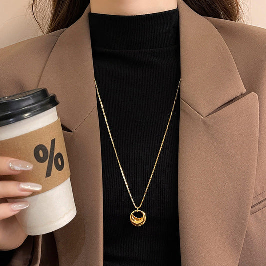 Long Gold Circle And Teardrop Pendant Necklace