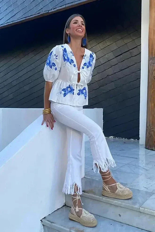 Blusa peplum con lazo floral