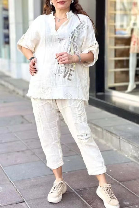 Conjunto de dos piezas de blusa y pantalones holgados con cuello en V y media manga para mujer