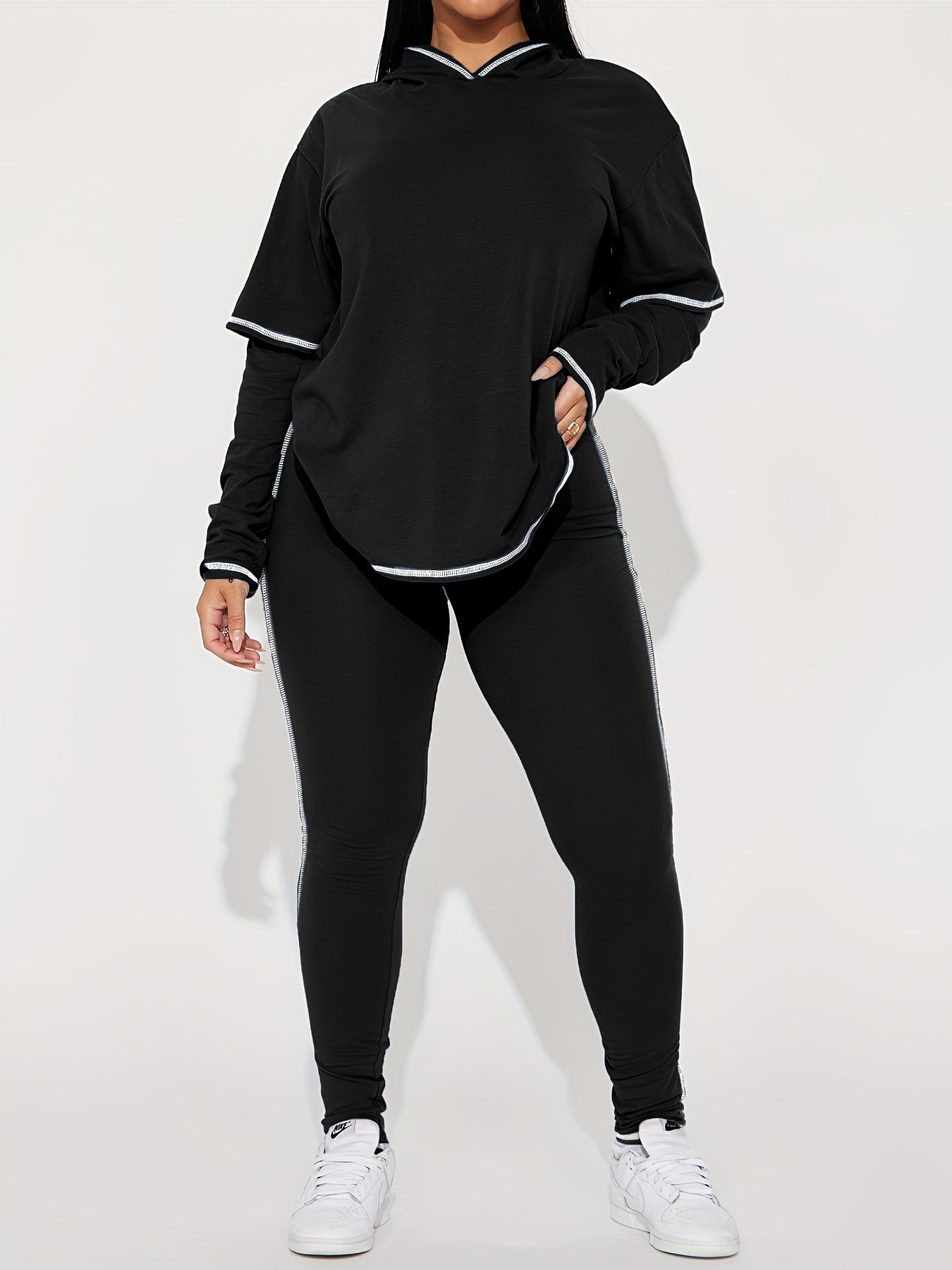 Conjunto de dos piezas de sudadera con capucha y pantalones ajustados de manga larga de color liso informal para mujer