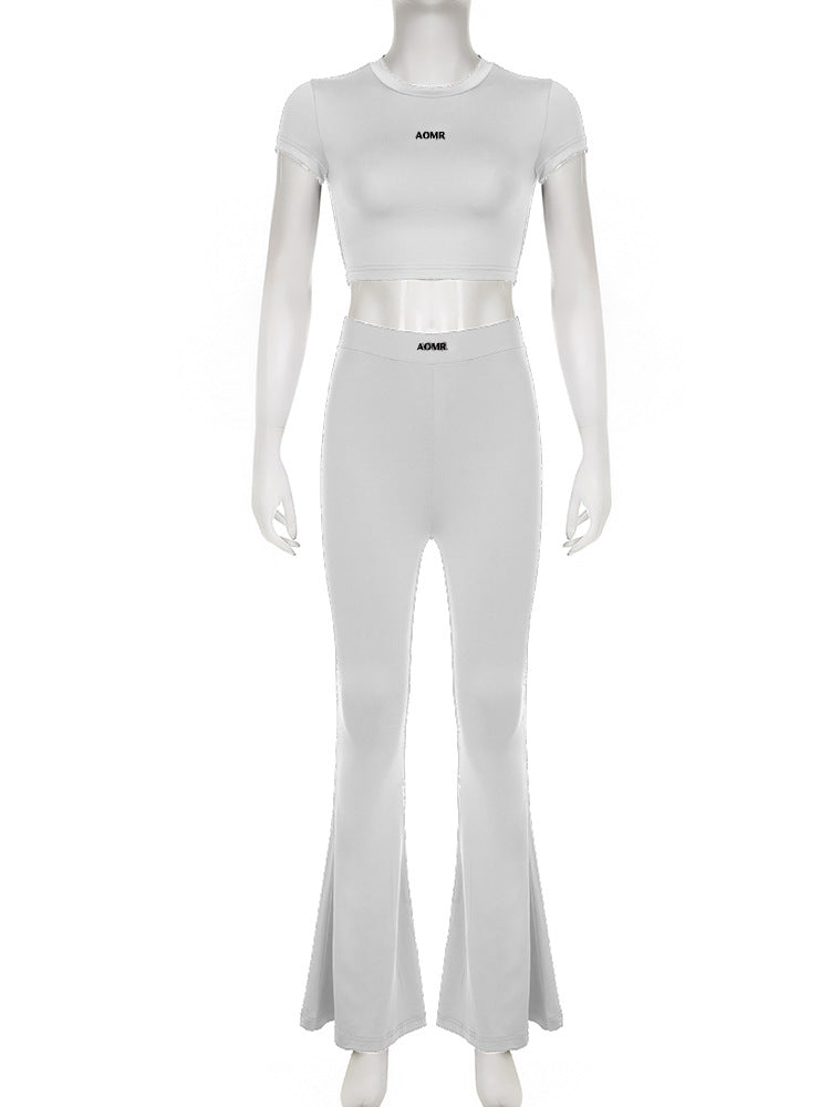 Conjunto de dos piezas de top y pantalón de manga corta de color liso informal para mujer