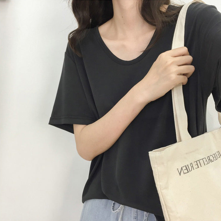 Camiseta holgada informal de color liso con cuello en V y manga corta para mujer