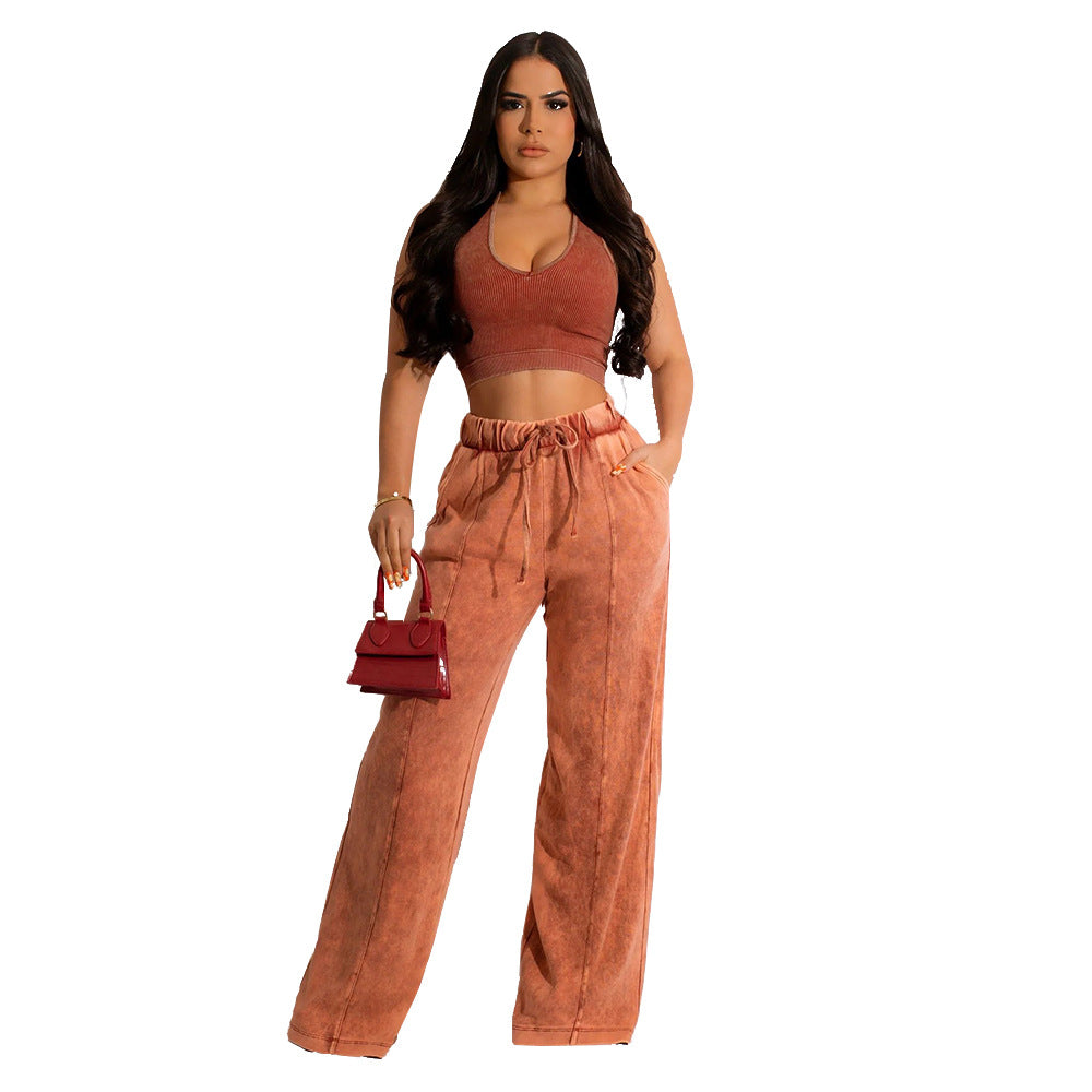 Conjunto de dos piezas de camiseta sin mangas y pantalones anchos de color liso para mujer