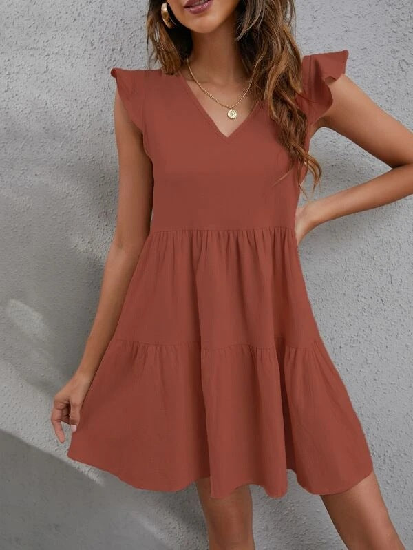 Vestido informal de mujer con cuello en V, mangas con volantes y costuras de color liso