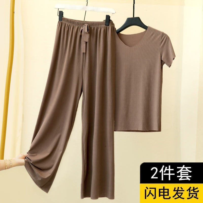 Conjunto de dos piezas de camiseta y pantalón de seda helada de color liso informal para mujer