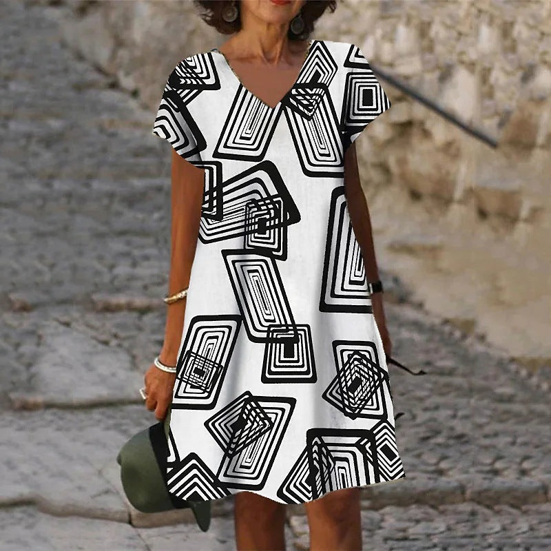 Vestido holgado con estampado gráfico y cuello en V de manga corta informal a la moda para mujer