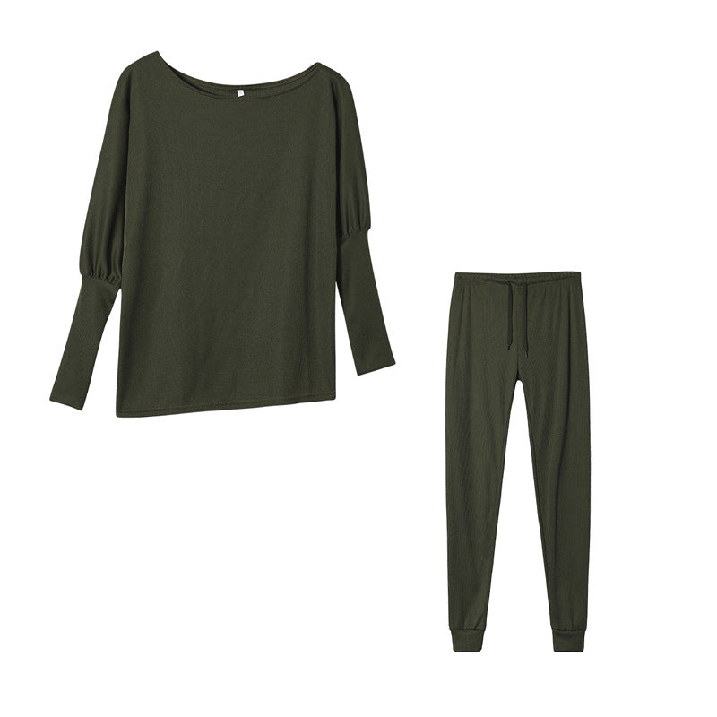 Conjunto de dos piezas formado por top y pantalón ajustado, manga larga, hombros descubiertos, color liso, informal, a la moda para mujer