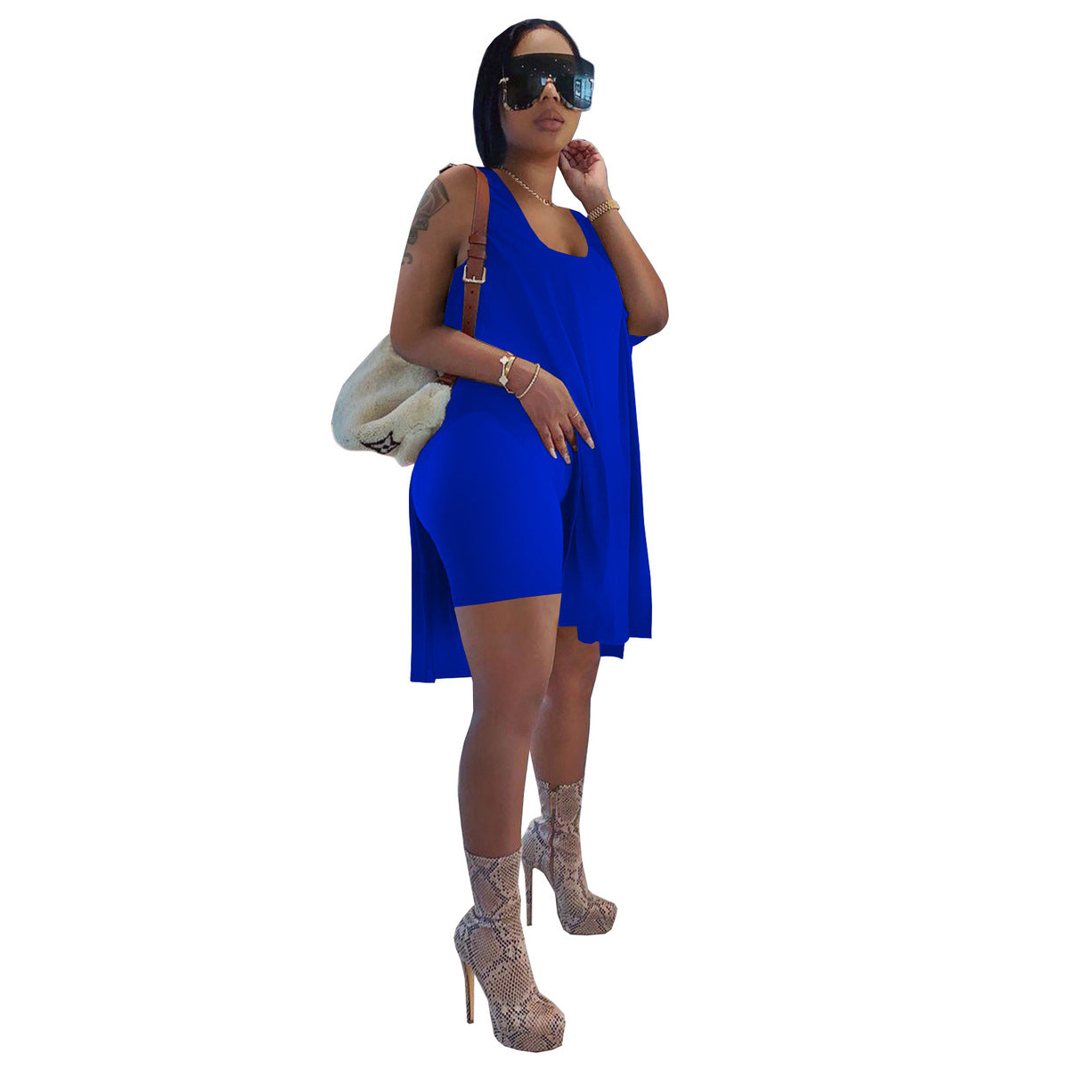 Conjunto de dos piezas de camiseta sin mangas holgada y pantalones cortos ajustados de color liso para mujer