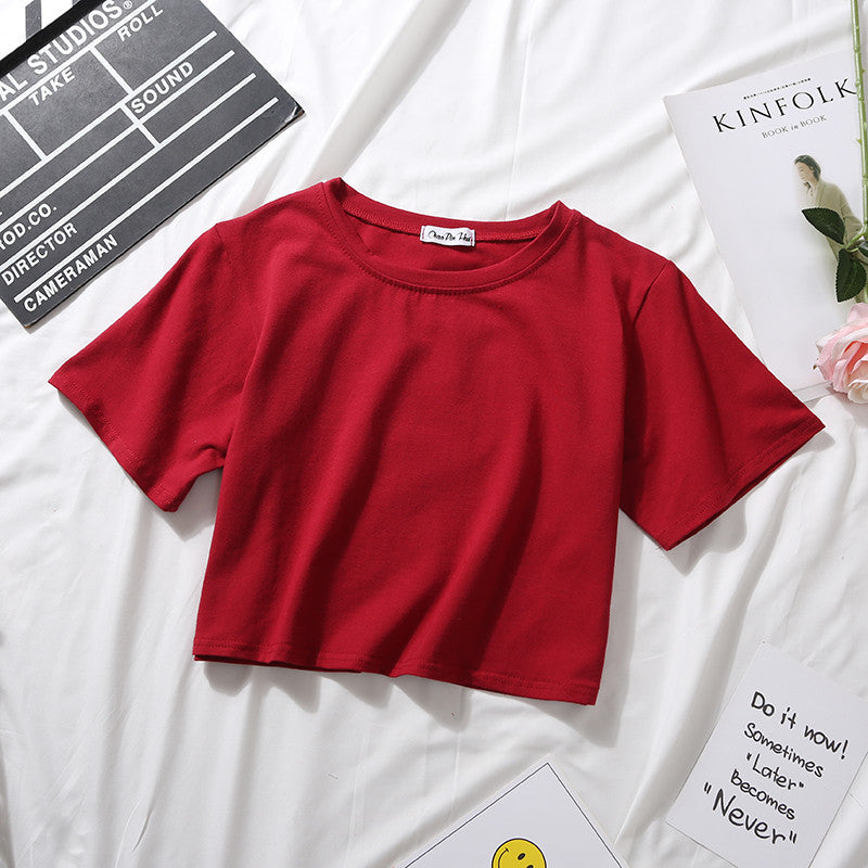Camiseta básica de verano para mujer, de manga corta, color liso, con cuello redondo y cintura alta, informal, holgada