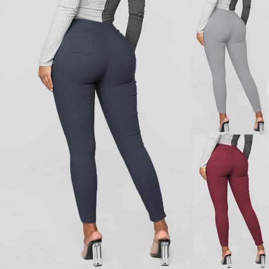 Pantalones ajustados informales de cintura alta con bolsillos y colores sólidos básicos de talla grande para mujer