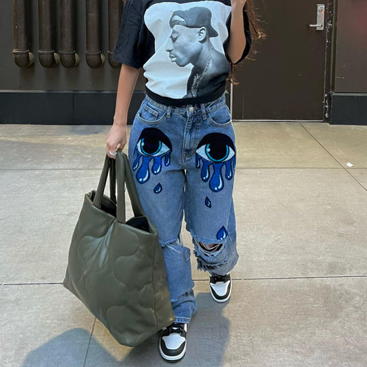 Vaqueros de pierna ancha con estampado de ojos rotos e informales para mujer