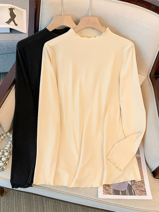 Camiseta básica informal holgada de talla grande con cuello alto y manga larga en color liso para mujer