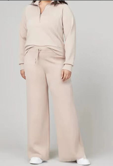 Conjunto de dos piezas formado por top y pantalón con cremallera, manga larga, color liso, informal, para mujer