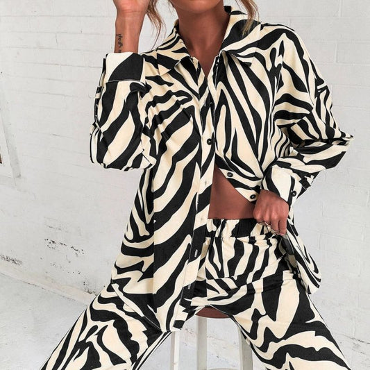 Conjunto de blusa y pantalón de manga larga con estampado de rayas informales a la moda para mujer