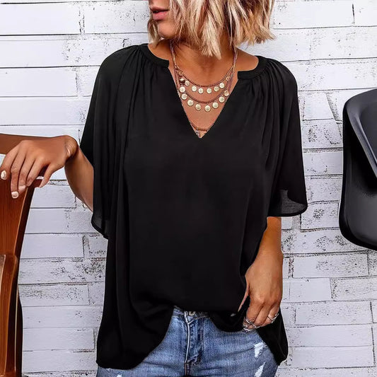 Blusa informal holgada de color liso con cuello en V y manga corta para mujer