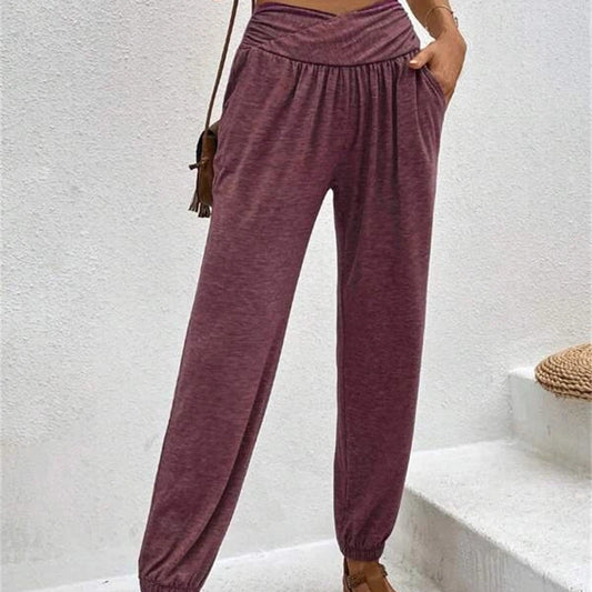Pantalones deportivos holgados con puños de color liso a la moda para mujer