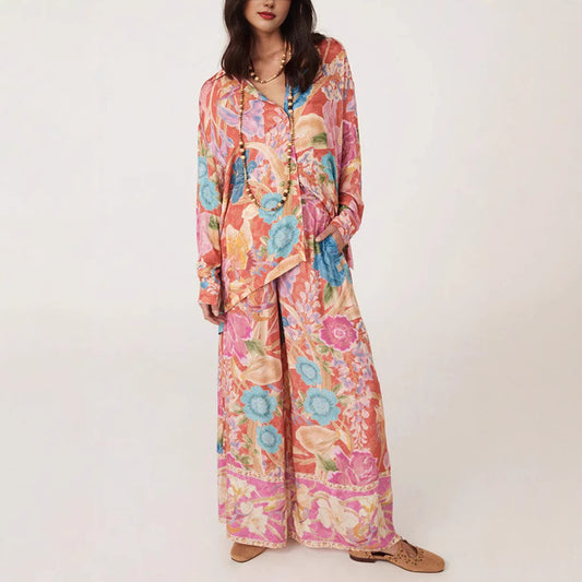 Conjunto de dos piezas de blusa y pantalones holgados de manga larga con solapa y estampado floral para mujer