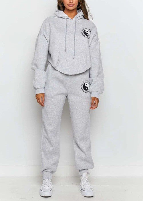 Conjunto de dos piezas con sudadera y pantalón estampado holgado informal para mujer
