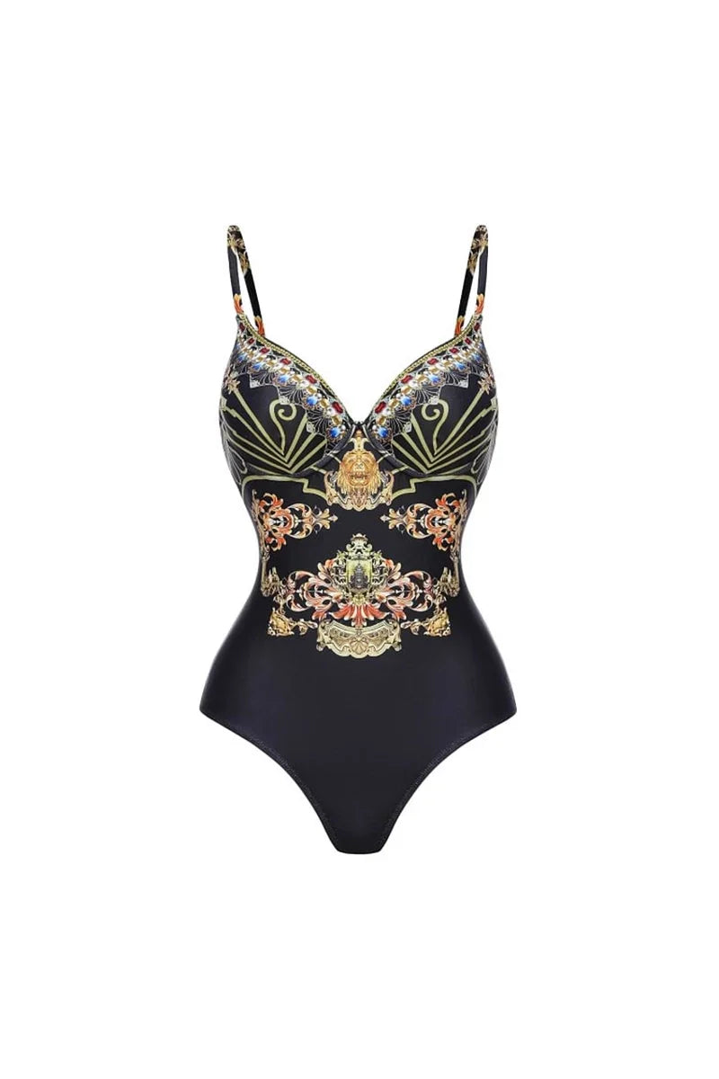 Traje de baño de una pieza con tiras y estampado dorado y negro