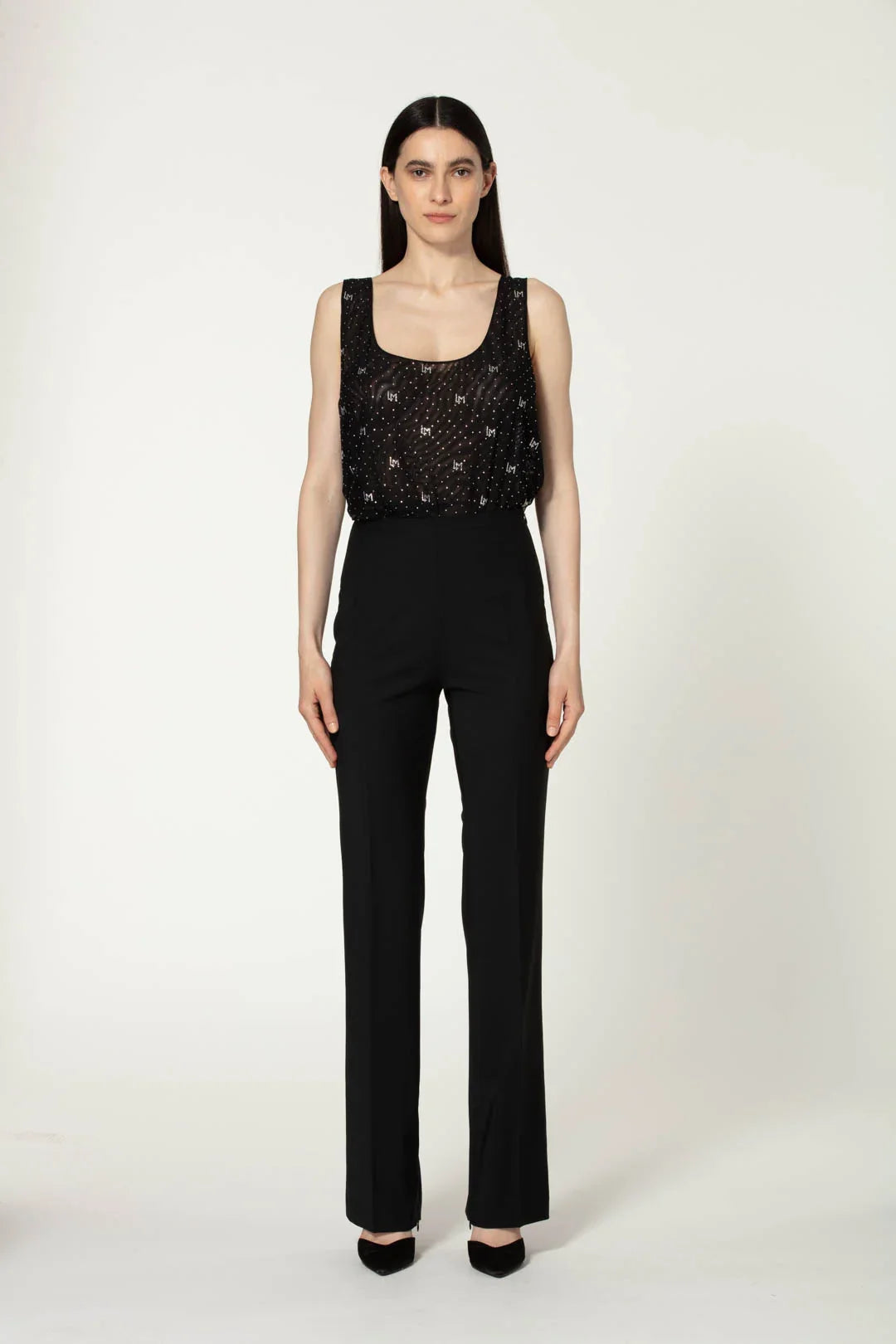 Conjunto de pantalones de acero líquido