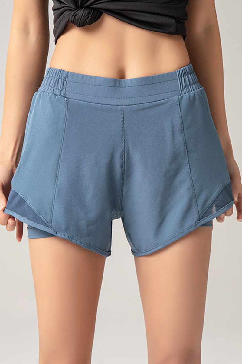 Pantalones deportivos de talle alto holgados con bolsillos y parches sólidos de color liso