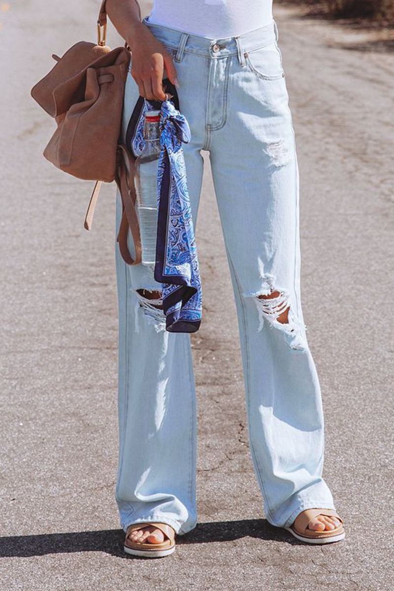 Pantalones de color liso con cintura media, pierna ancha y rotos de estilo urbano