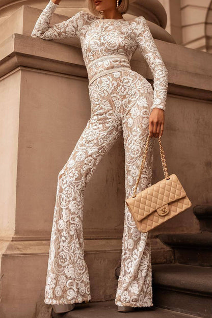 Monos elegantes de celebridades con encaje liso y patchwork con cinturón y cuello redondo.