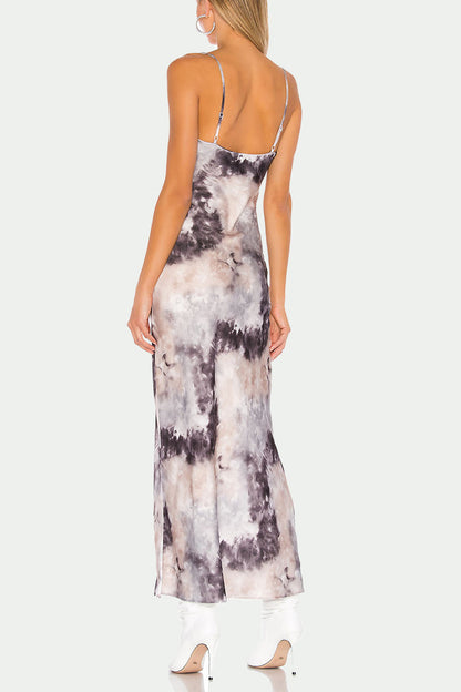 Vestido elegante con cuello asimétrico, abertura y estampado