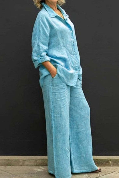 Conjunto informal sencillo de dos piezas con cuello vuelto, manga larga y bolsillos lisos