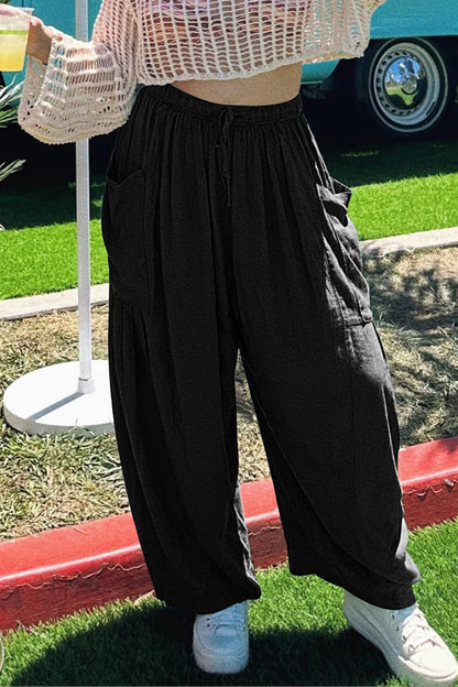 Pantalones casuales sencillos de color liso con bolsillos, holgados, de cintura media y pierna ancha.