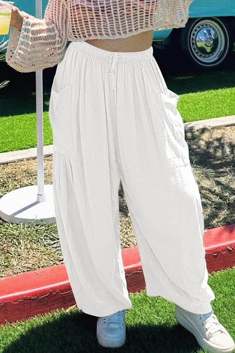 Pantalones casuales sencillos de color liso con bolsillos, holgados, de cintura media y pierna ancha.