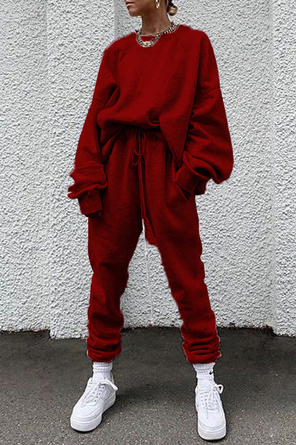 Conjunto informal de dos piezas con cuello redondo, manga larga y bolsillos lisos (14 colores)