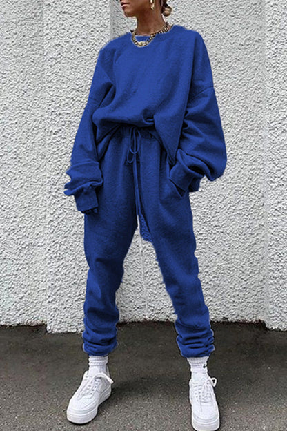 Conjunto informal de dos piezas con cuello redondo, manga larga y bolsillos lisos (14 colores)