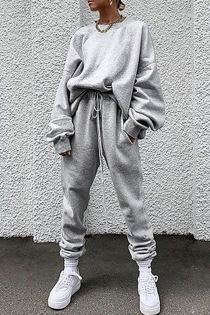 Conjunto informal de dos piezas con cuello redondo, manga larga y bolsillos lisos (14 colores)