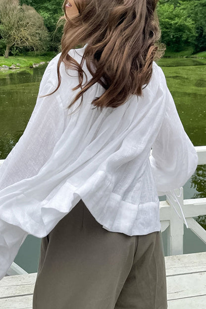 Blusa elegante de estilo británico con cuello de lazo y cinta lisa