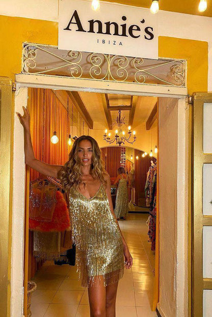 Minivestido con flecos brillantes