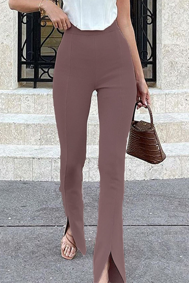 Pantalones de color liso con cintura alta, ajustados y con aberturas simples