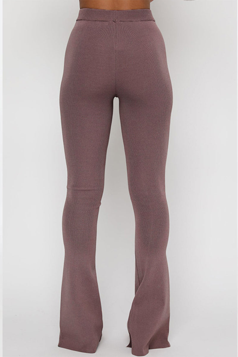 Pantalones de color liso con cintura alta, ajustados y con aberturas simples