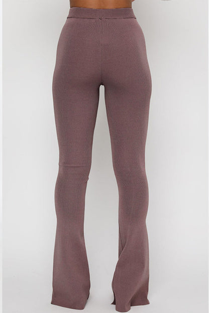 Pantalones de color liso con cintura alta, ajustados y con aberturas simples