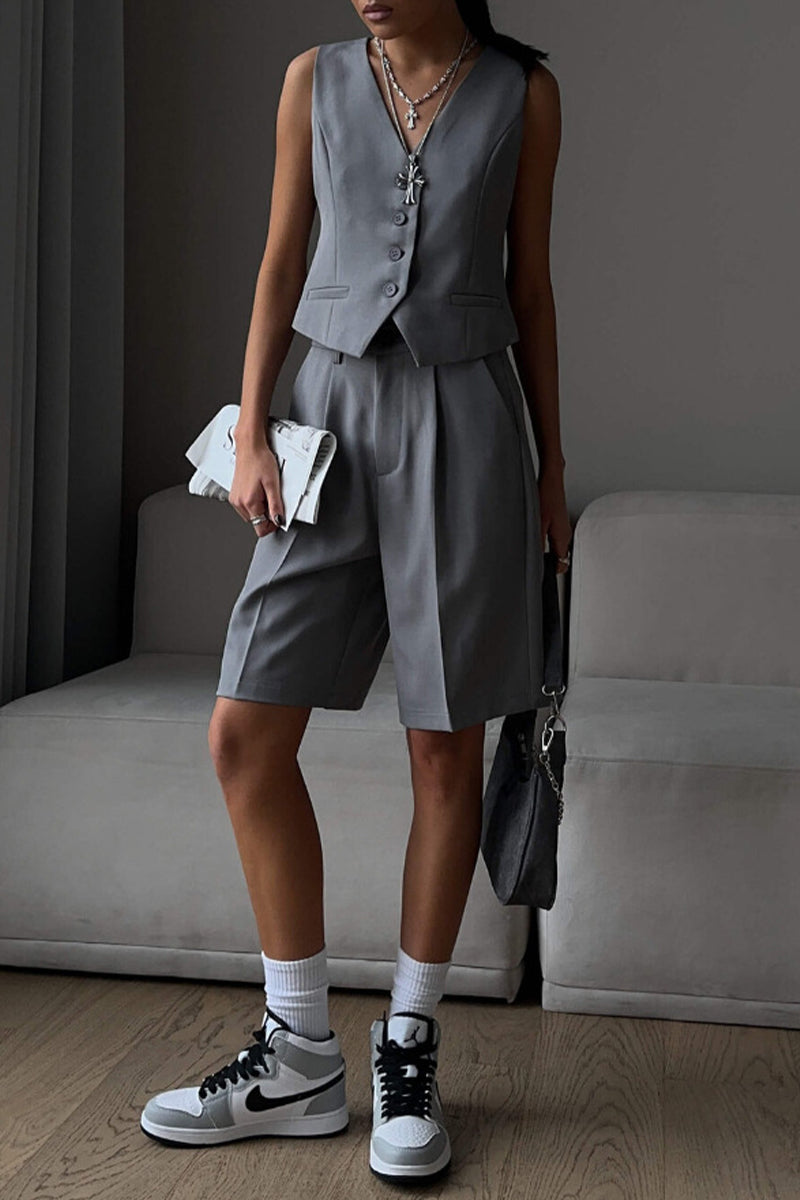 Conjunto de dos piezas elegante estilo británico con cuello en V, sin mangas, bolsillos sólidos y botones