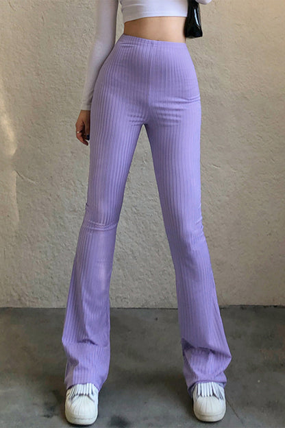 Pantalones casuales sencillos de color liso con cintura alta y botones.